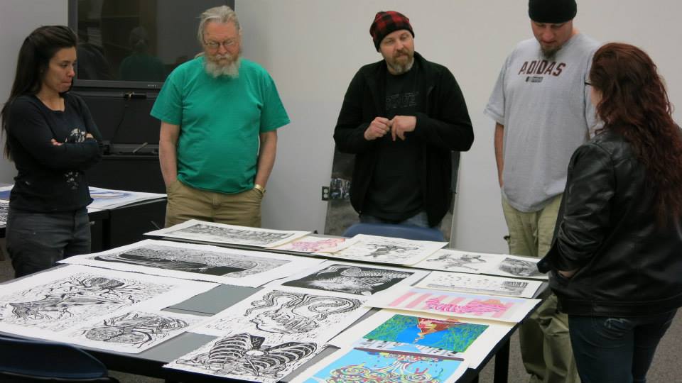 Cory, Shannon and John critique student prints