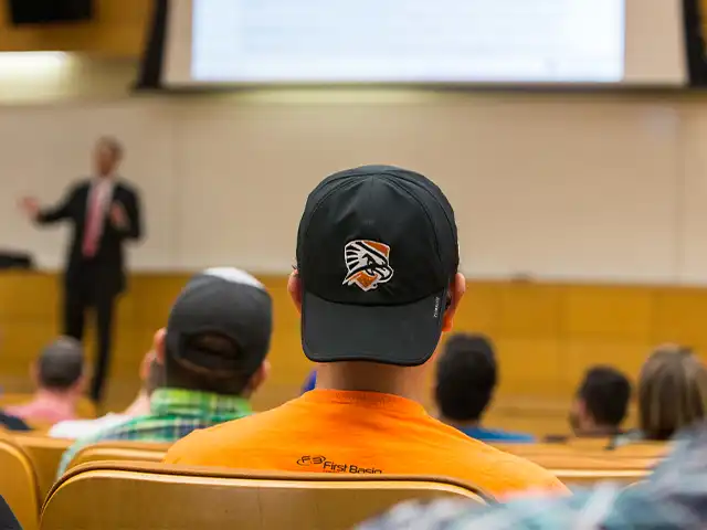 Photo of the back of a baseball cap with the UTPB Falcons logo