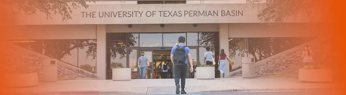 students coming and going from the Mesa Building on UTPB Campus