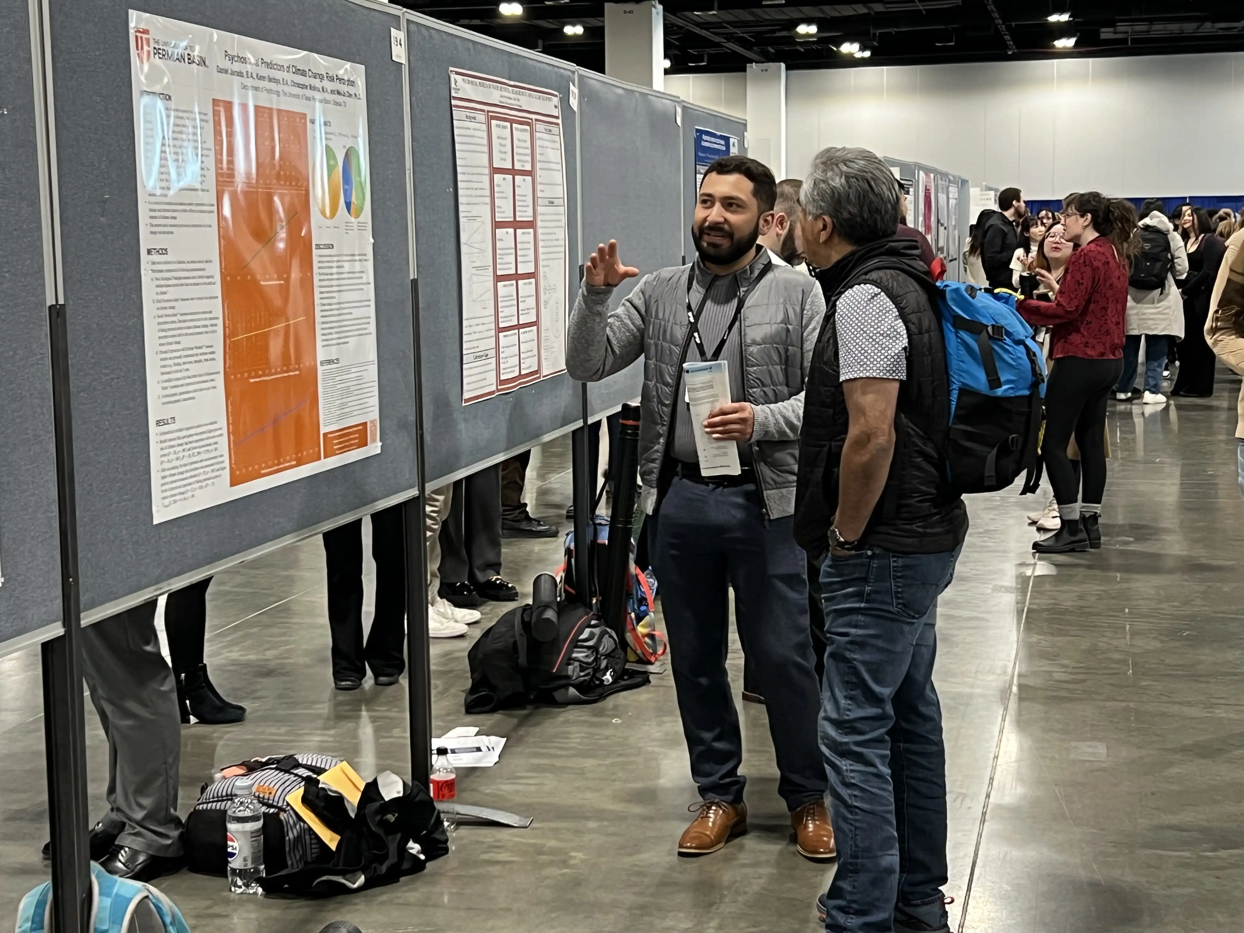 students presenting their research at the Society for Personality and Social Psychology Annual Convention