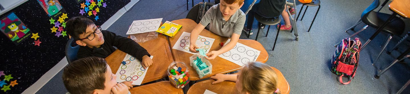 students at their desks learning