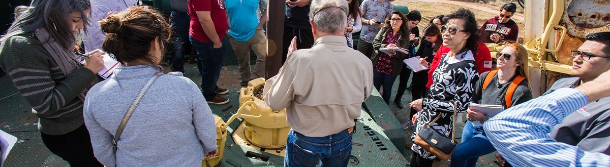 Students at well site