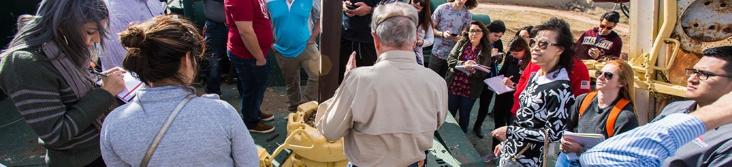 Professor with Students at a rig