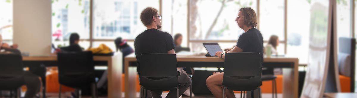 Students researching in library