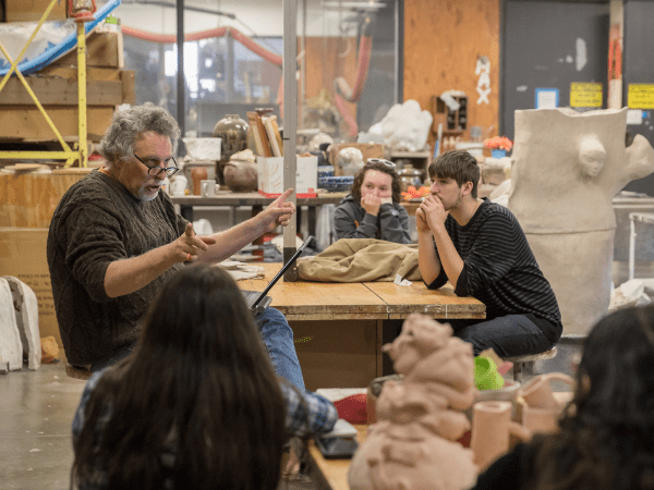 Chris Stanley teaching art class