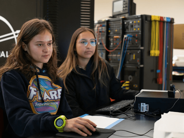 two female engineer students learning in lab