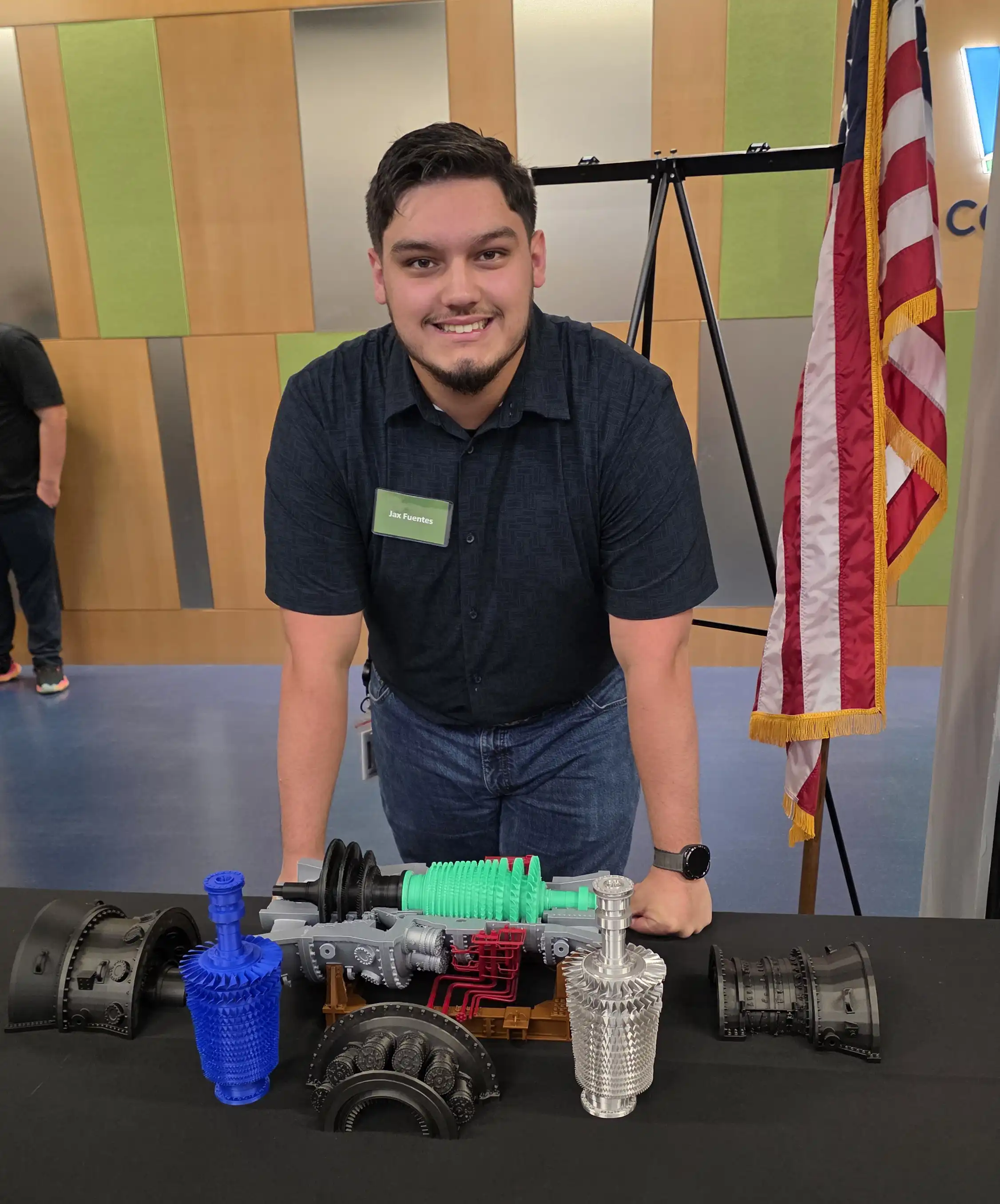A photo of Jax at a tabling event. 