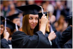 Image of a Girl moving her tassel on her graduation cap