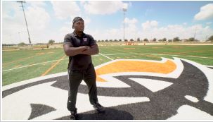 JaVaun Johnson standing on the football field