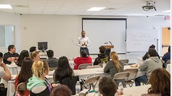 Matthew Pinkney speaking in the Student Union