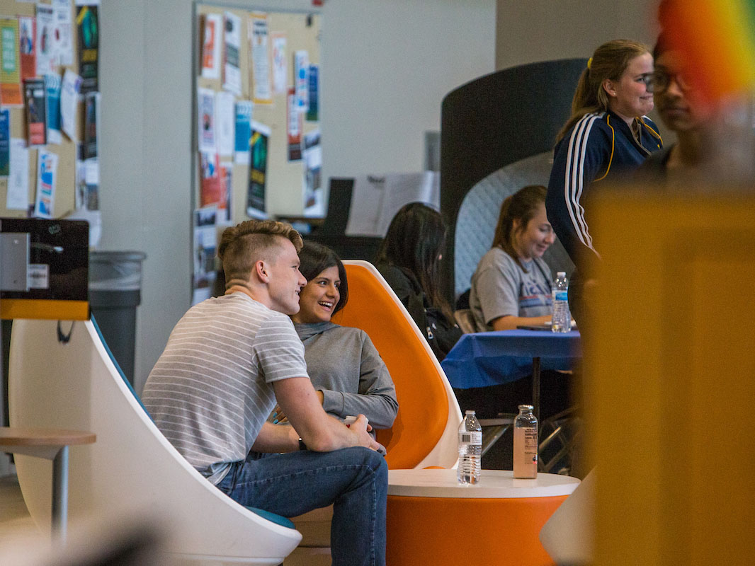 Students talking with other students in the Activity Center