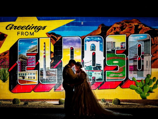 Couple in front of El Paso sign