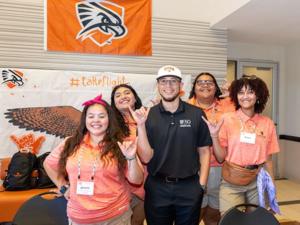 UTPB students with falcons up at orientation