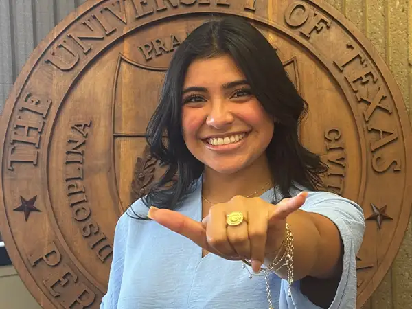Alejandra Molina showcasing her new class ring