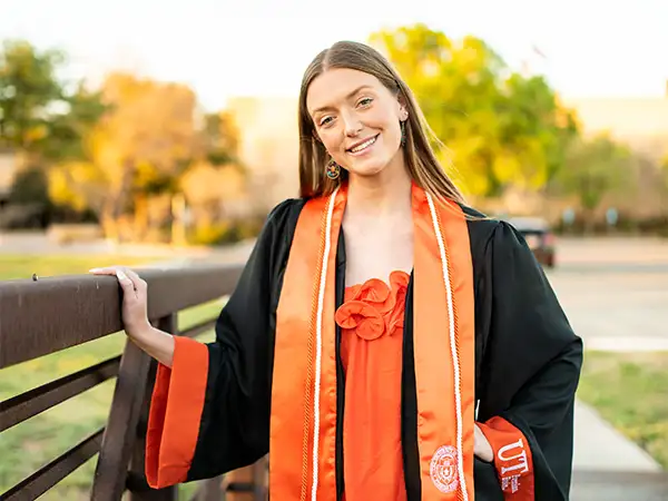 Hannah Gore senior picture on a bridge