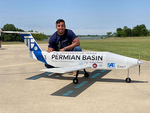 Ramiro Andujo picture with SAE plane