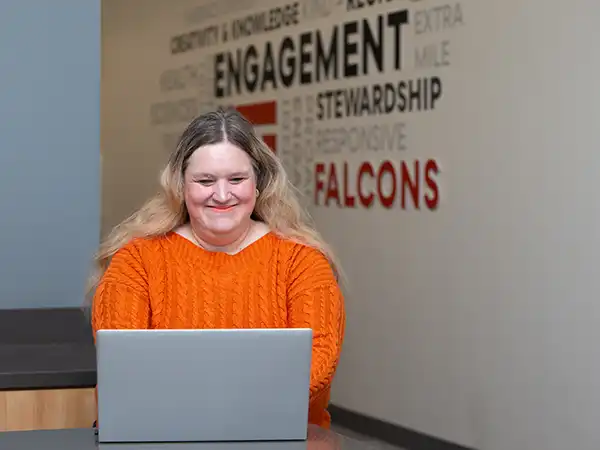 UTPB student on computer