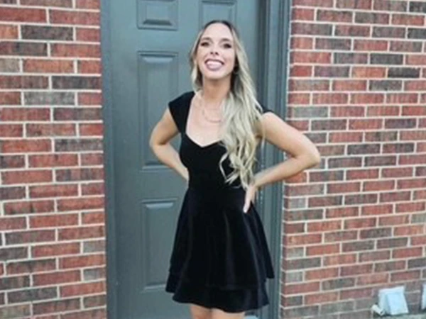 Dr. Emily Mason in a black dress