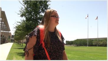 Megan Jones walking on Campus