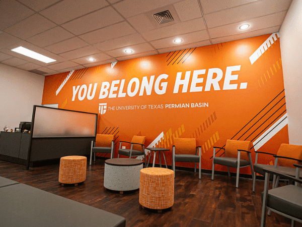 Photo of welcome center wall that says You Belong Here