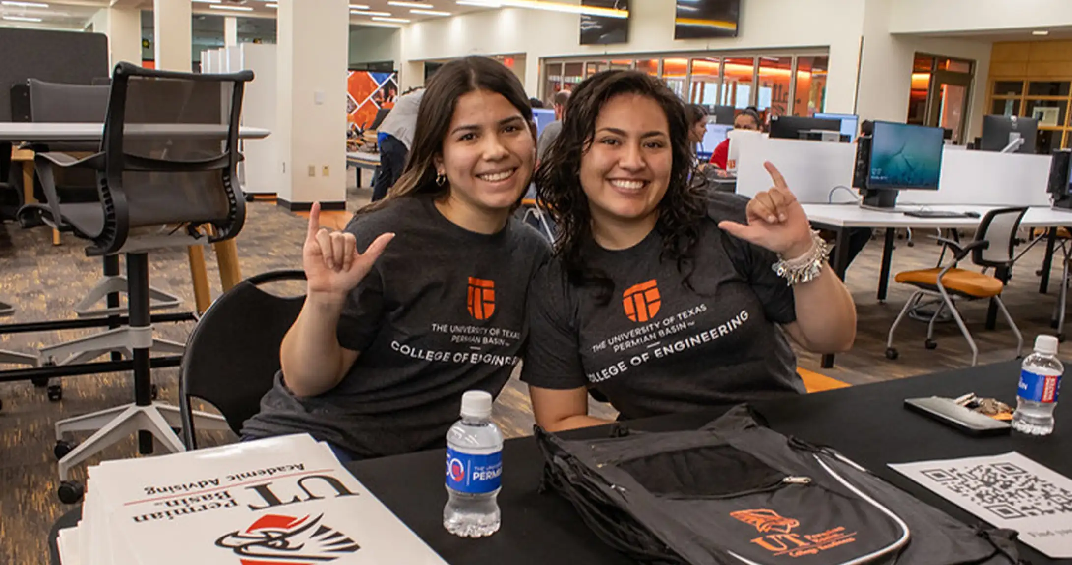 workers at enrollment event