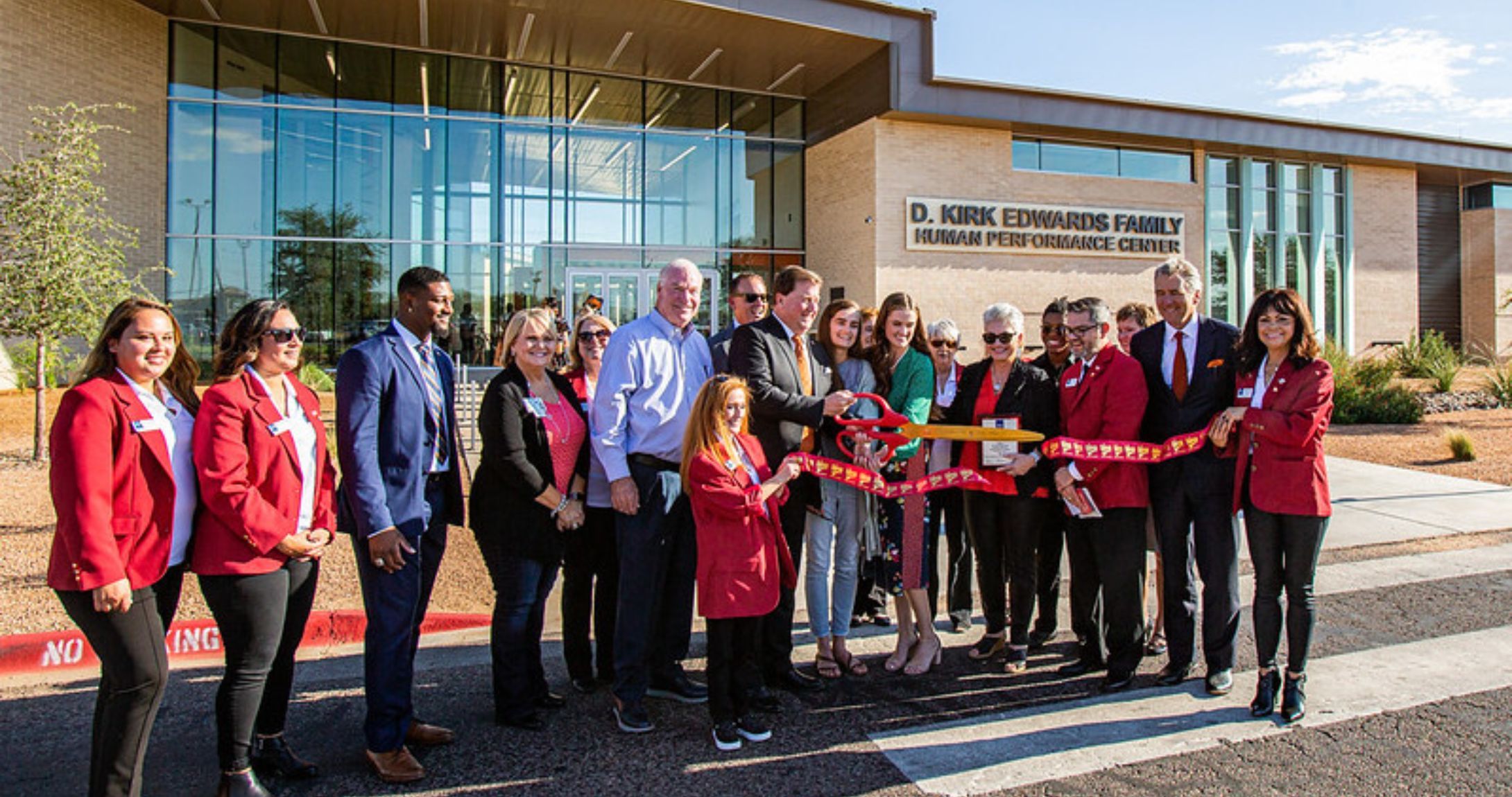 Kirk Edwards cutting ribbon