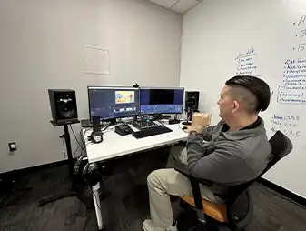 Podcast Studio with student working