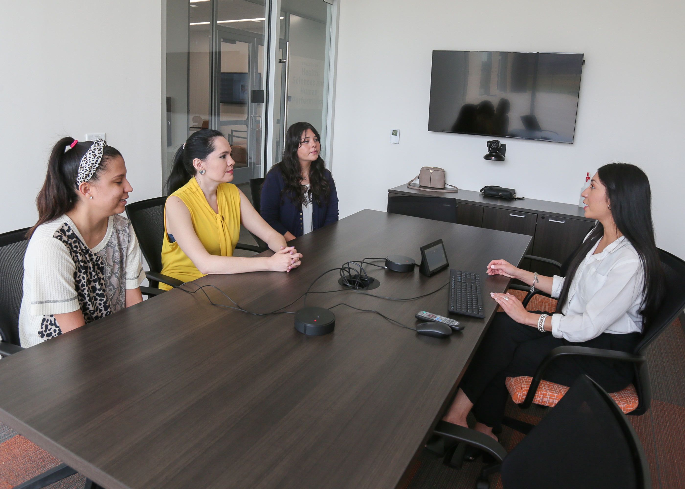 social work students in conference room talking