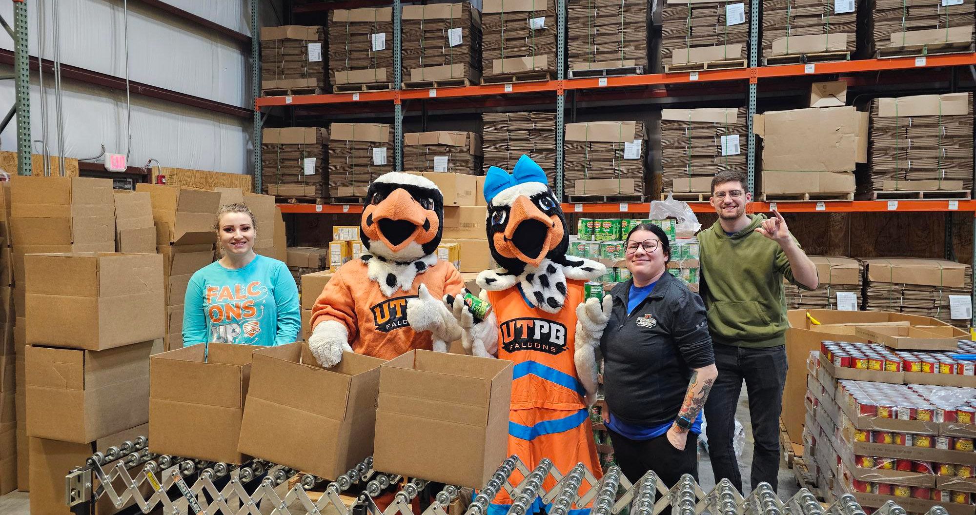 Volunteers smile for a photo at the West Texas Food Bank