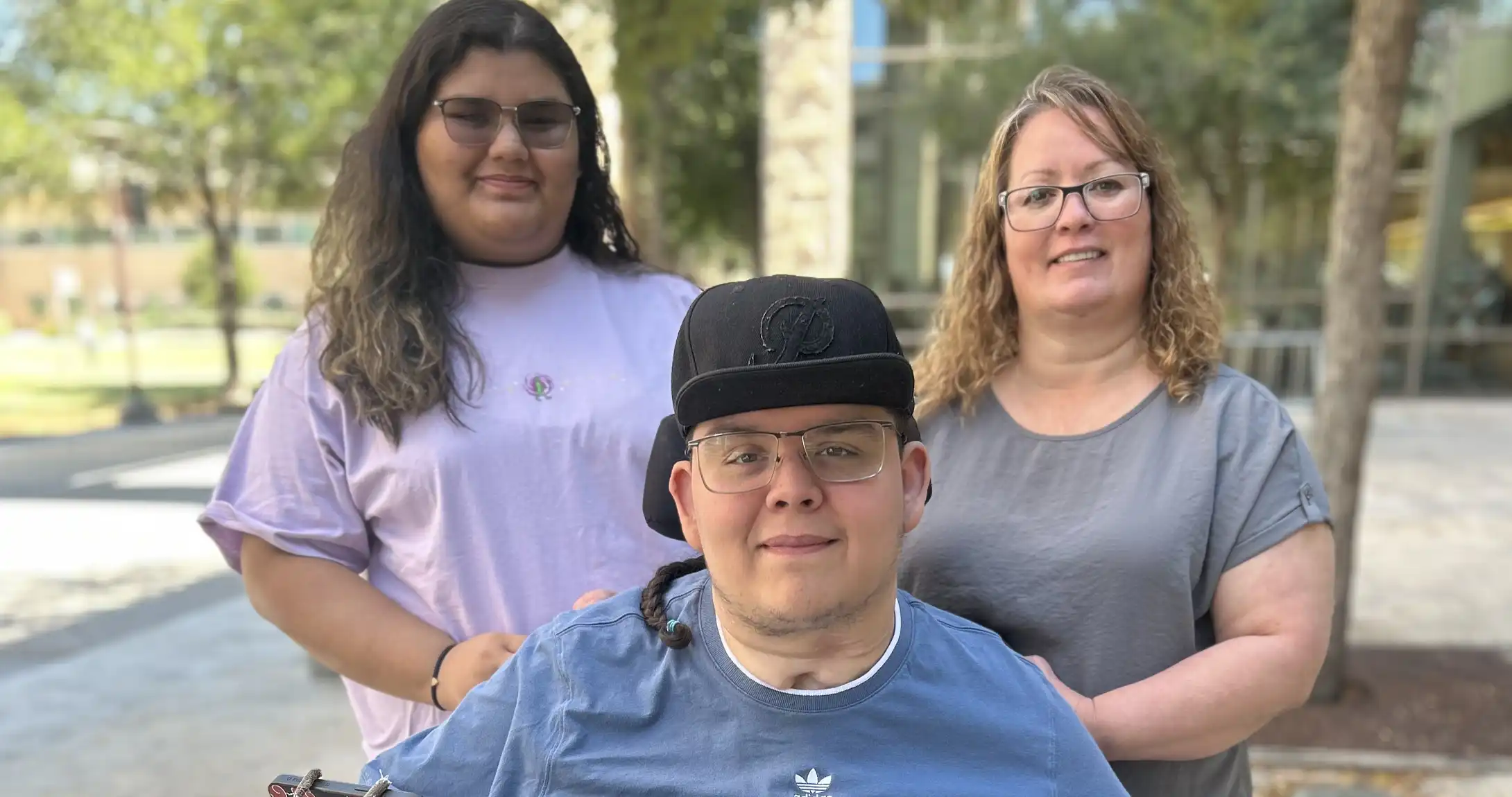 Blantyn Gusman on campus with his mom, Michelle, and his sister.