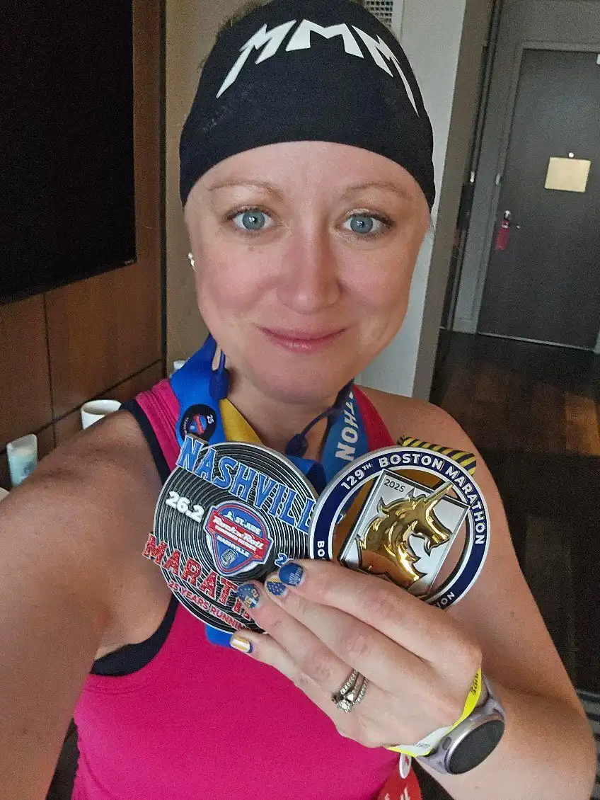 Terra James with her marathon medals