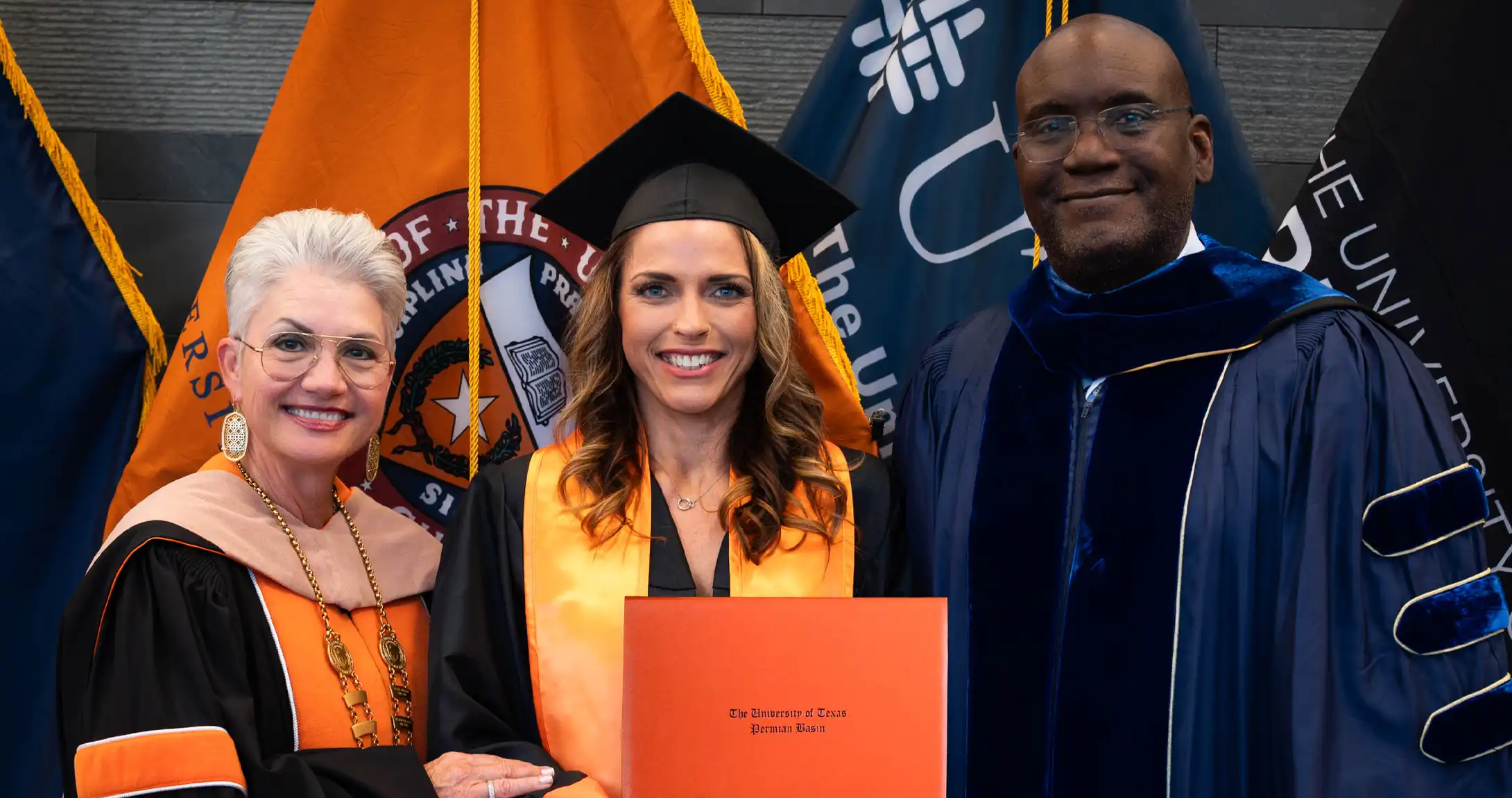 Avis Armstrong accepting her UTPB diploma.