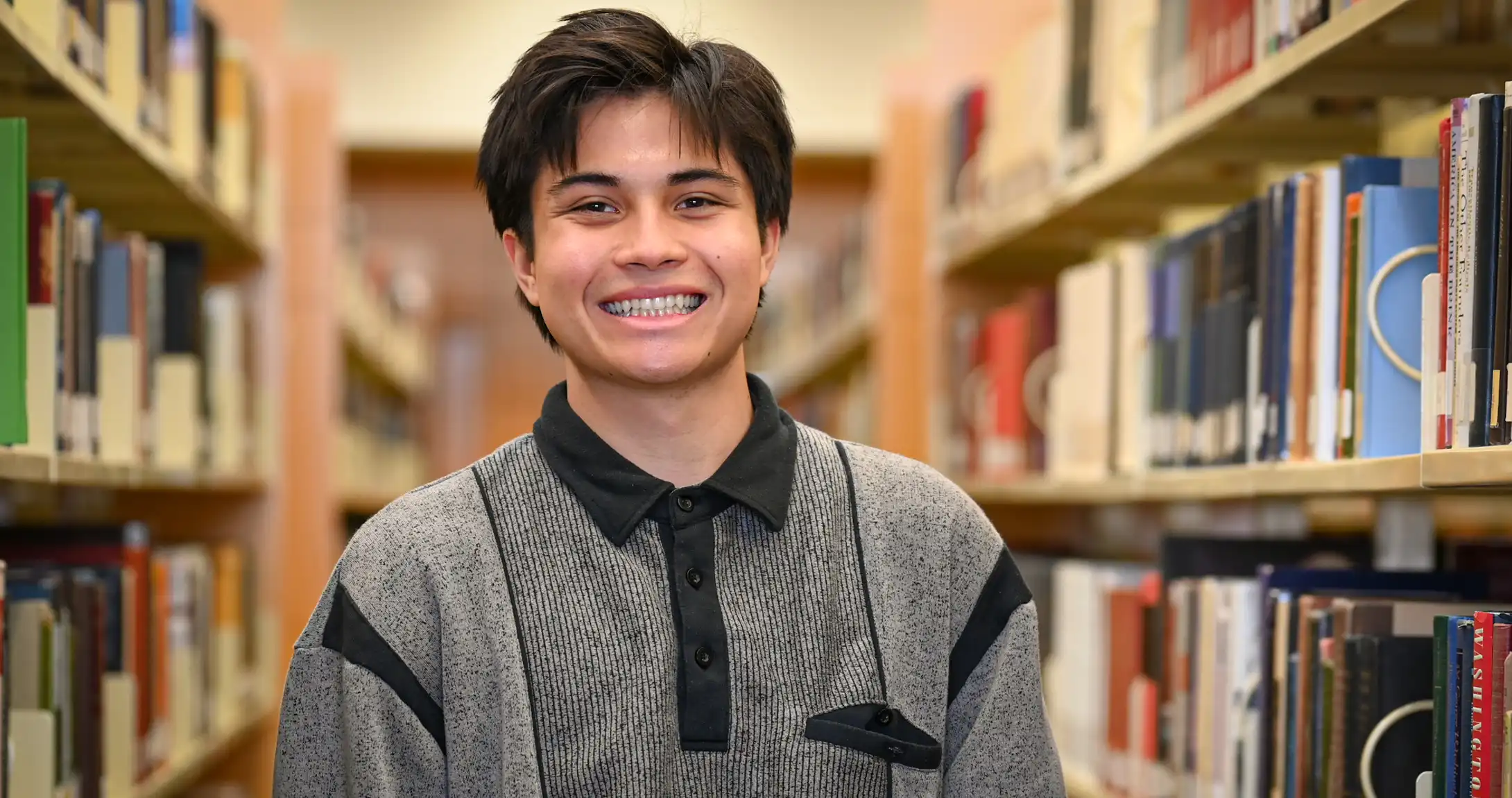 Brett Jacobsen in UTPB's on-campus library. 