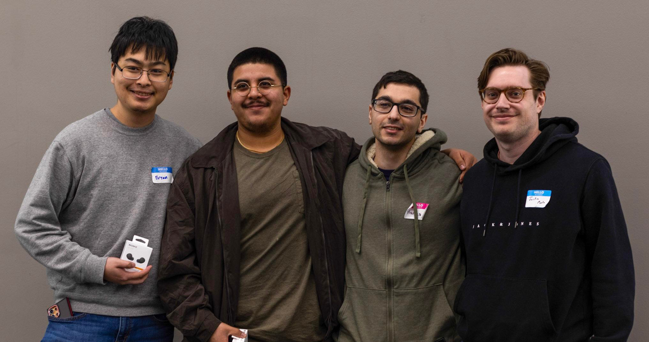 Four computer science students from UTPB at the Axxess Hackathon at UT Dallas standing together posing for a photo after being announced the winners of the hackathon.