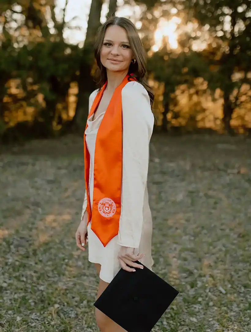 Heather wearing a UT Permian Basin graduation stole