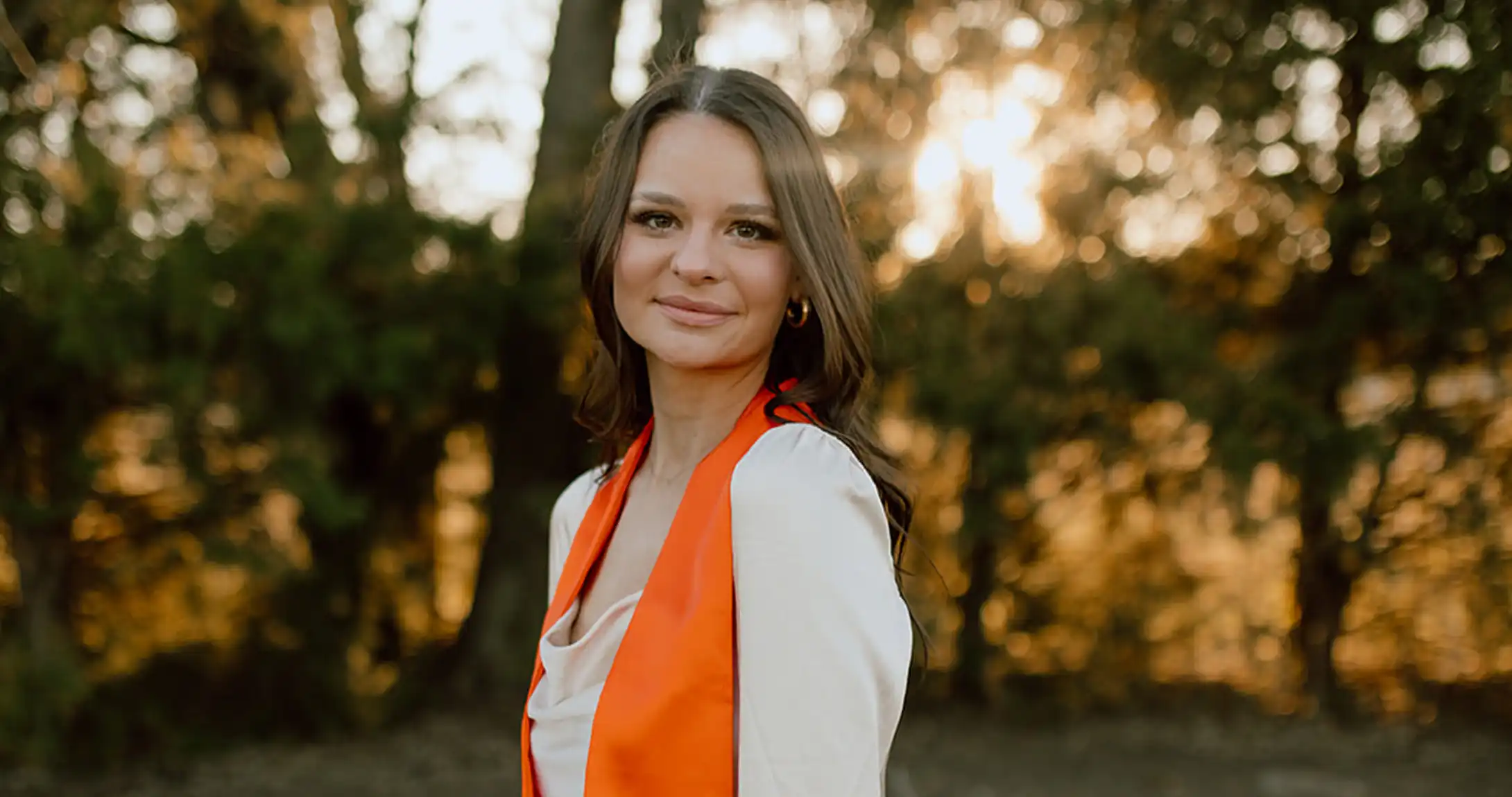Heather wearing a UT Permian Basin graduation stole.