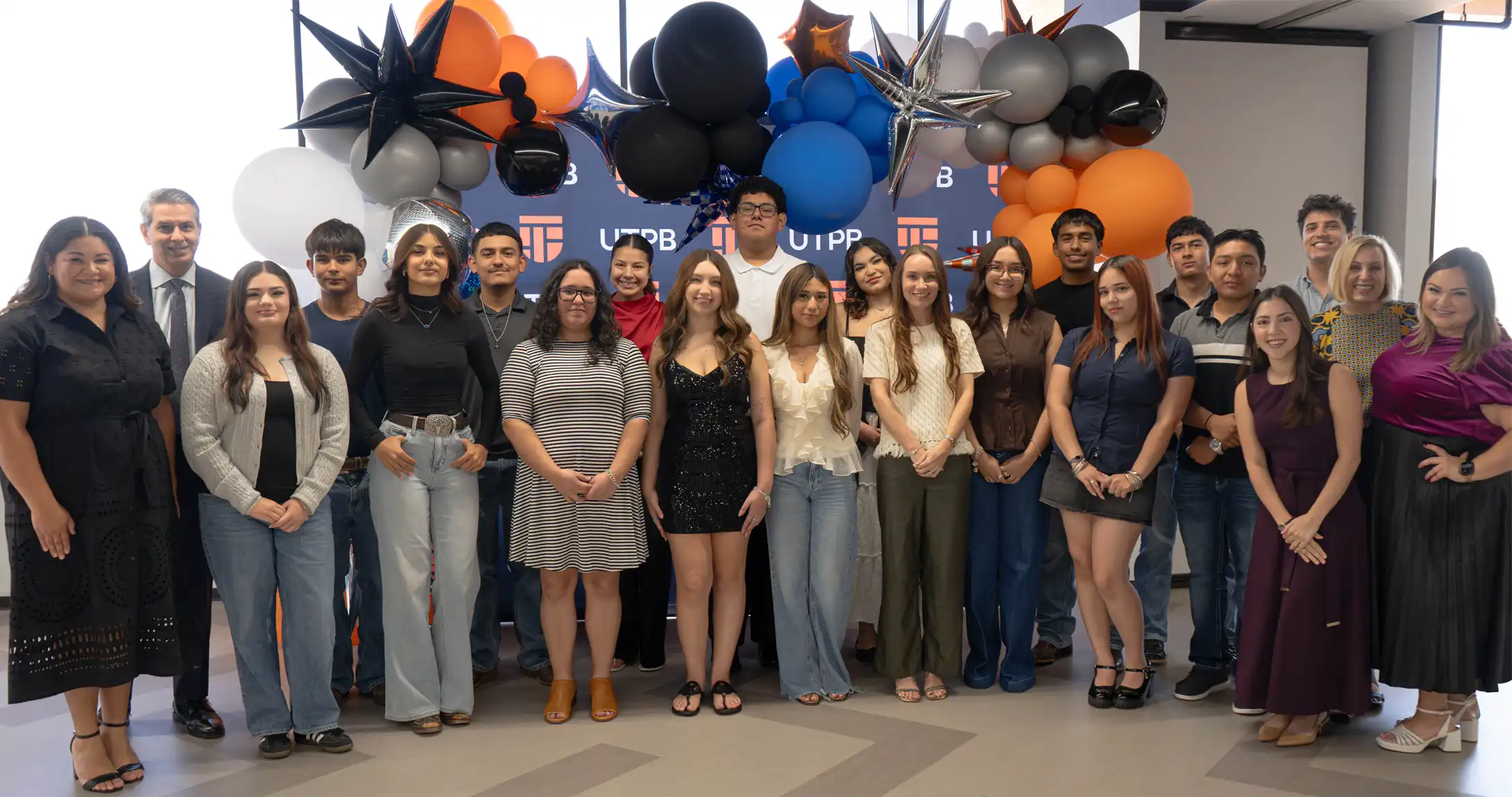 The inaugural cohort of López Scholars, the President and CEO of the Hector and Gloria López Foundation, the career services team at the López Scholars luncheon.
