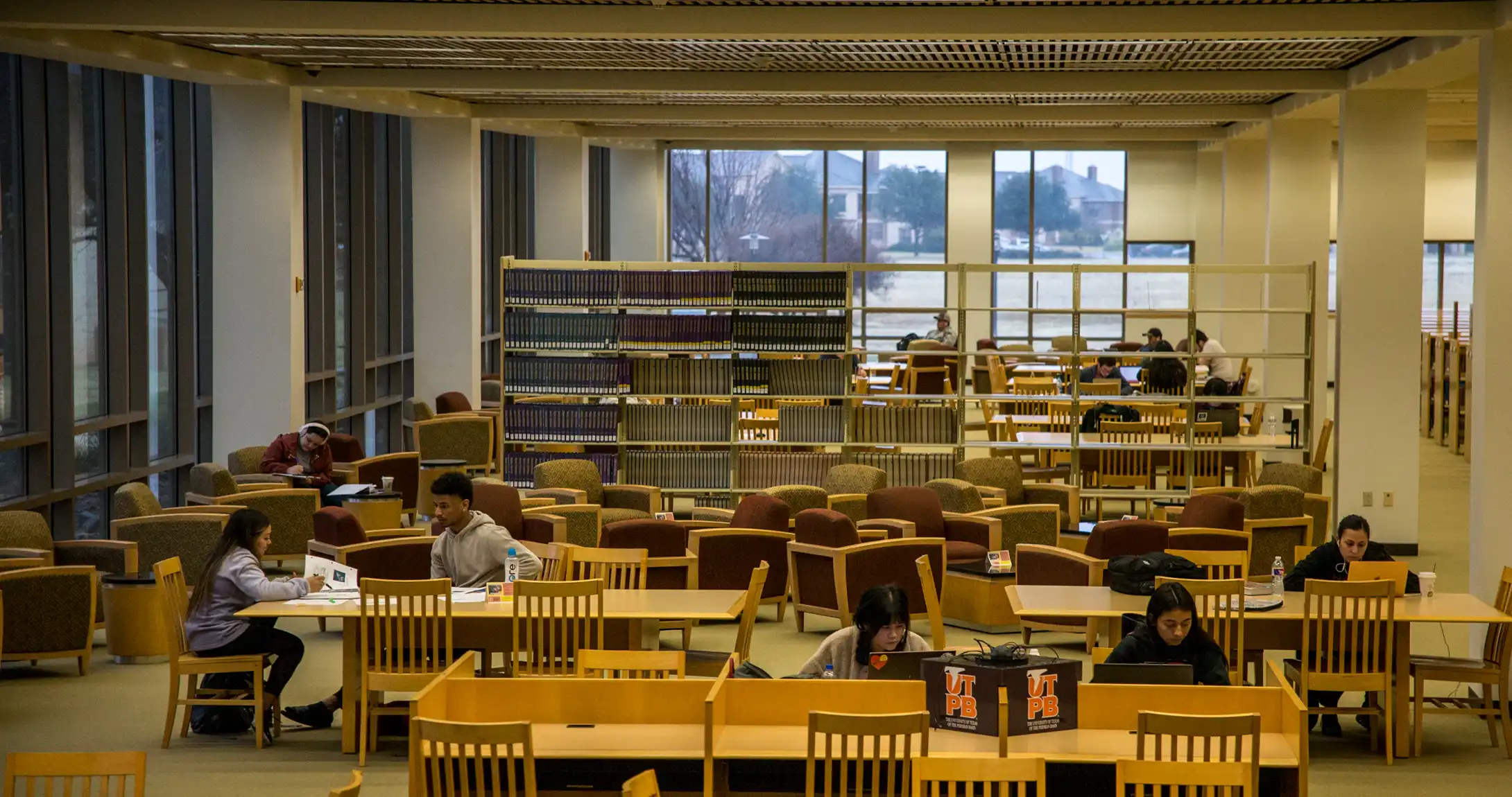 Students studying in the on-campus library at UTPB. 