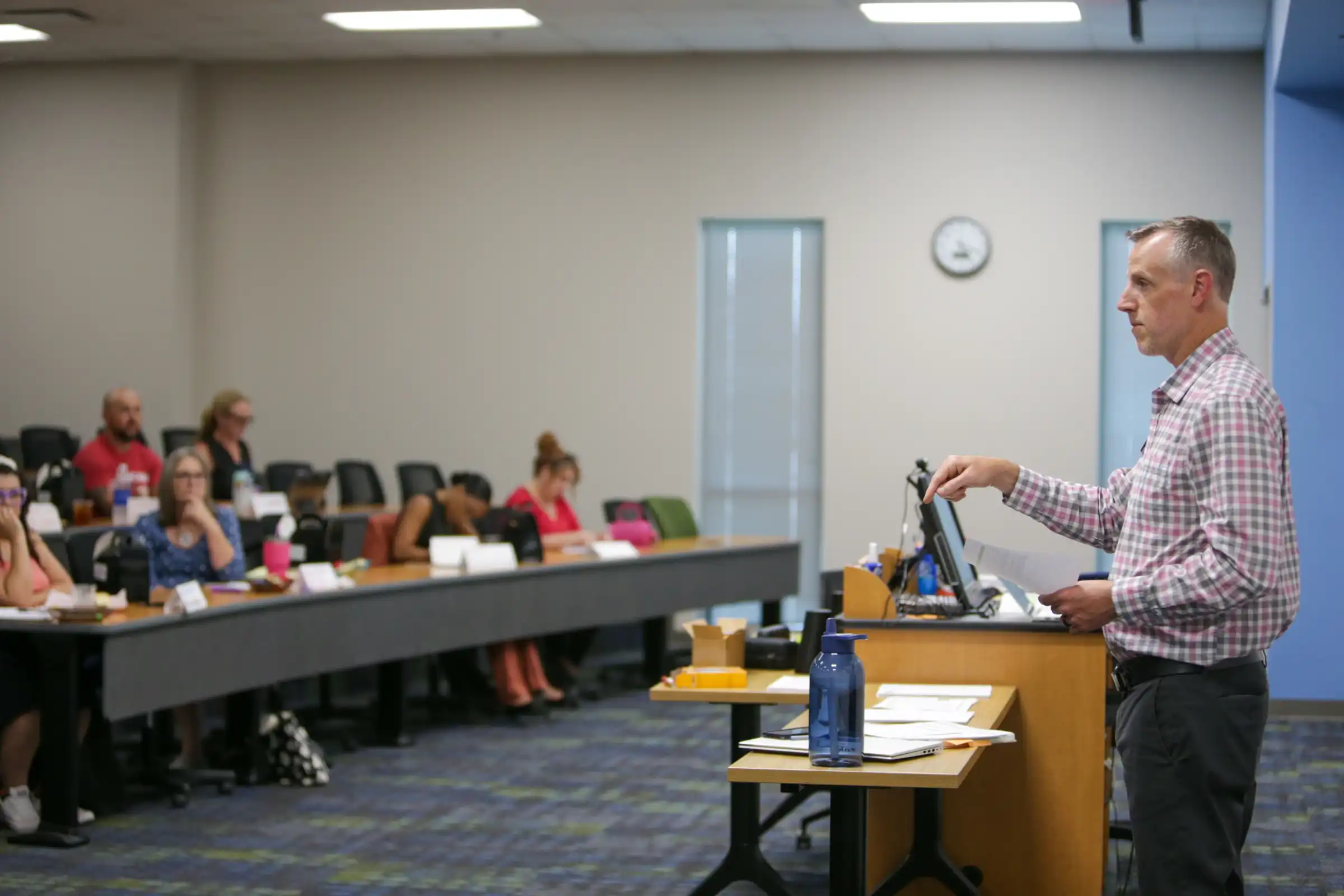 Brian Shedd giving a lecture to one of the SmallBiz cohorts during their meeting. 
