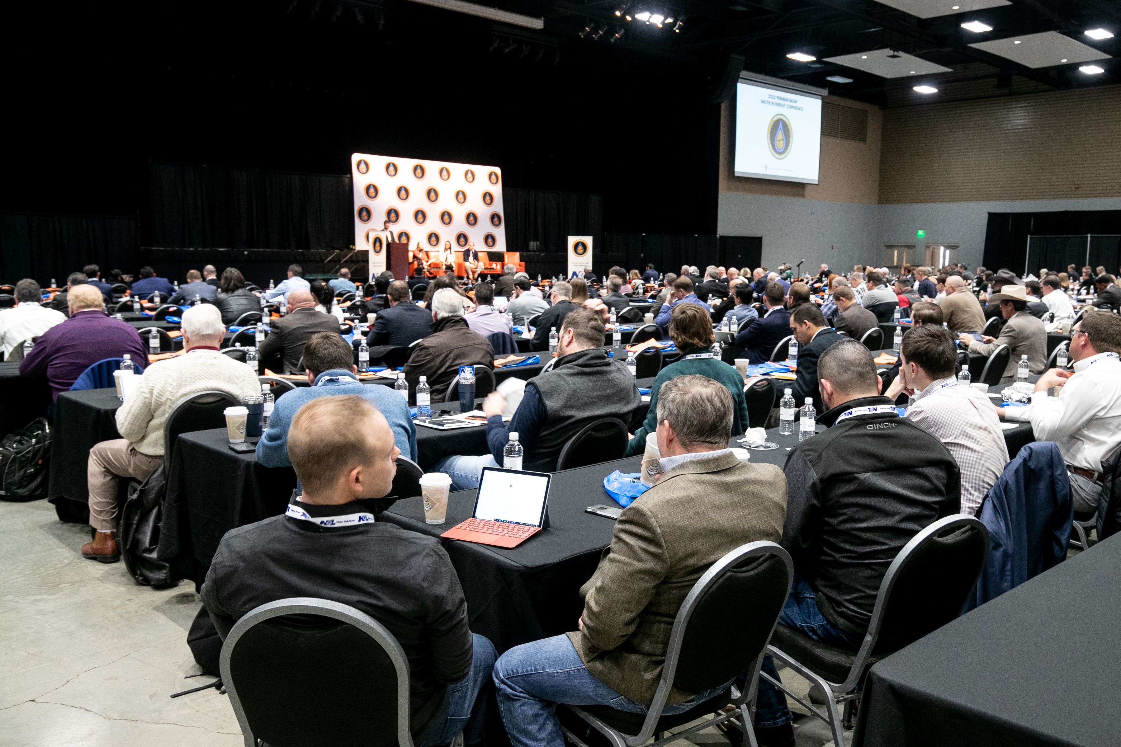 water in energy conference attendees listening to a speaker in 2022