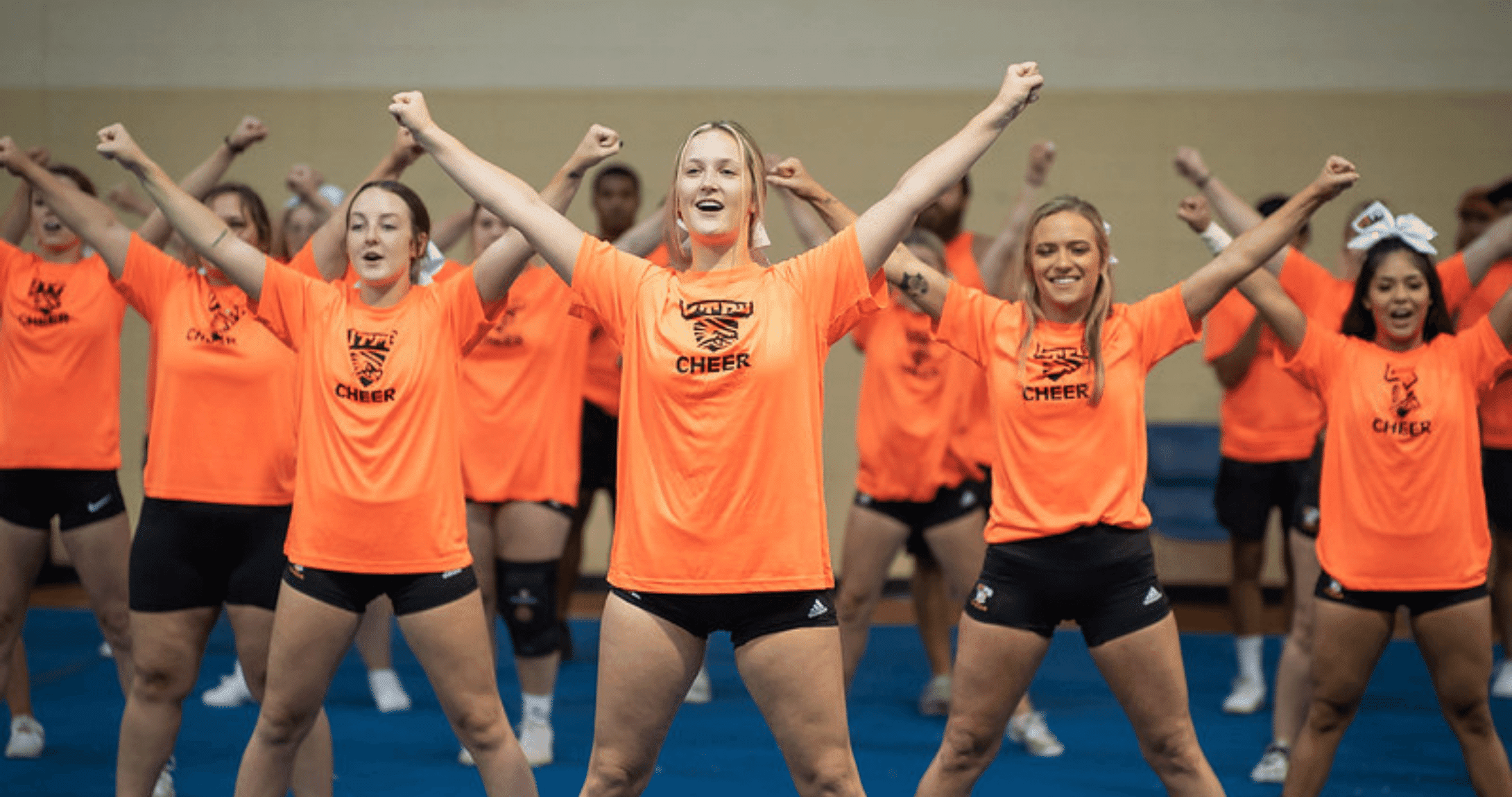 Cheer squad cheering at practice