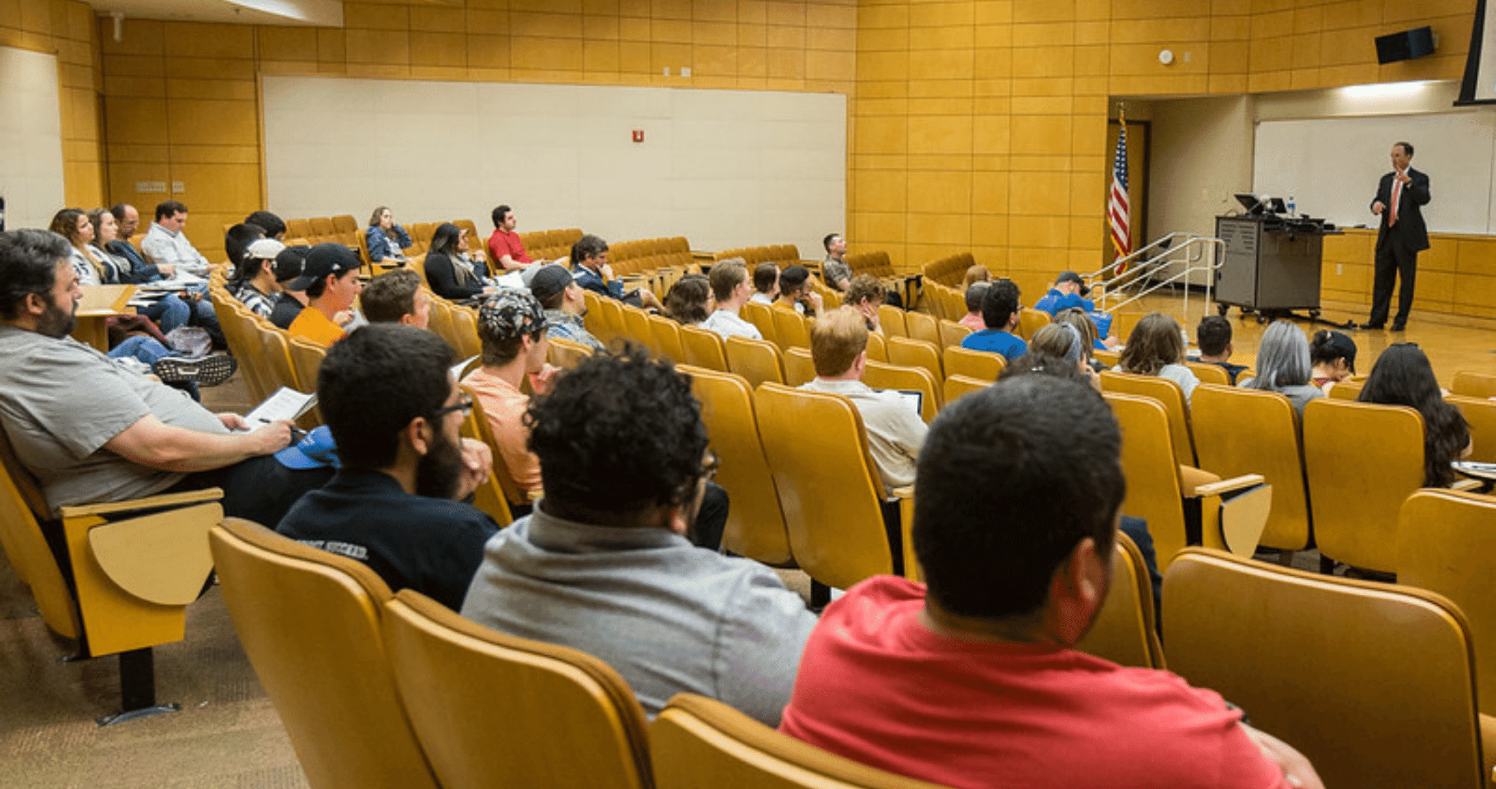 students sitting in lecture hall 