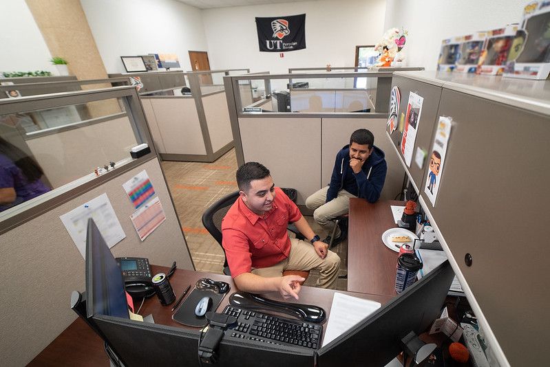 financial aid employee helping a student