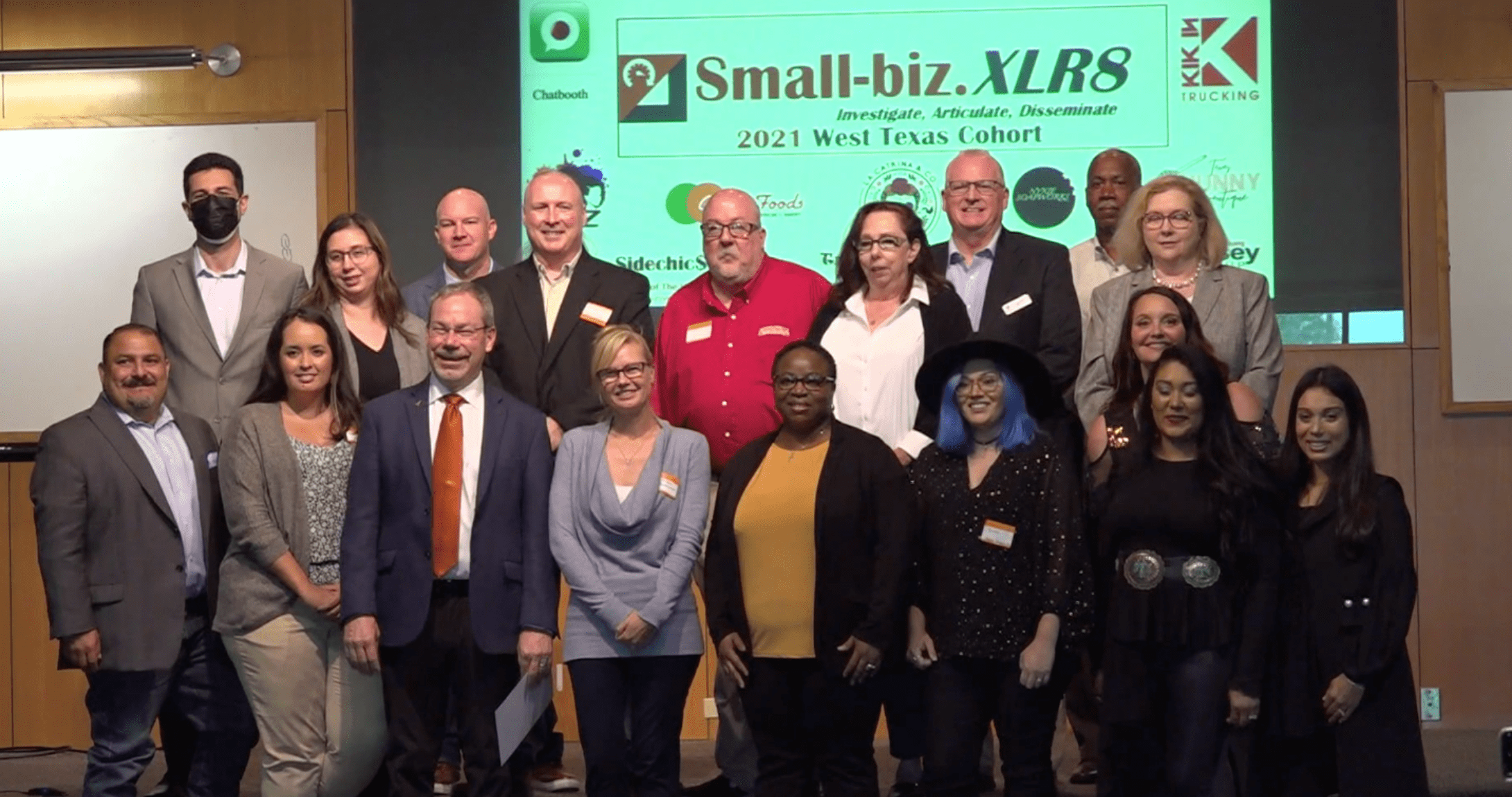 small business owners smiling for camera after pitch presentations