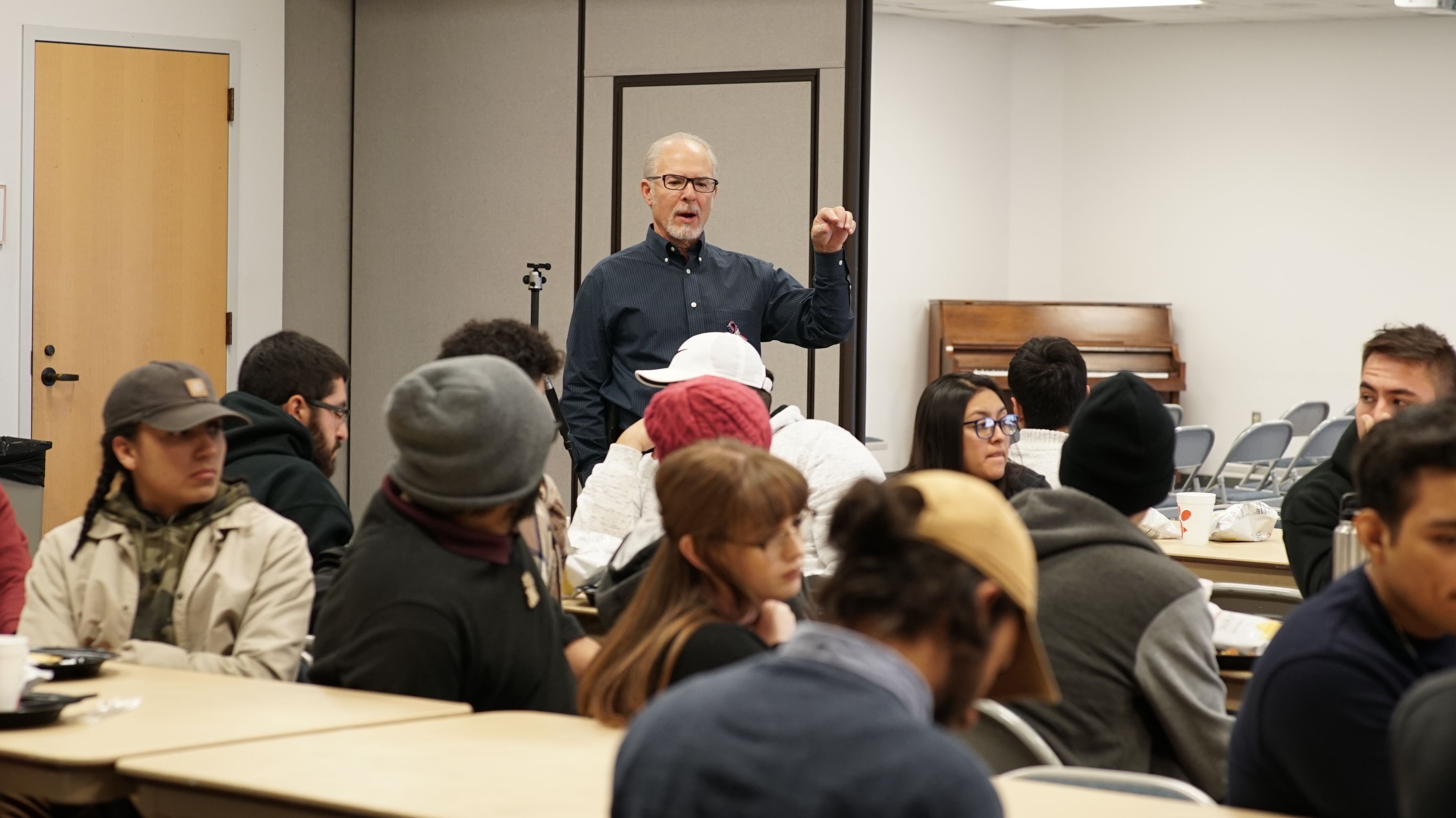 Kurt Verlei speaking to class