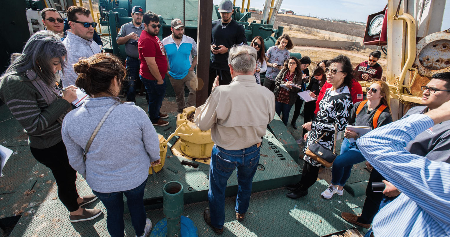 Students at oil well