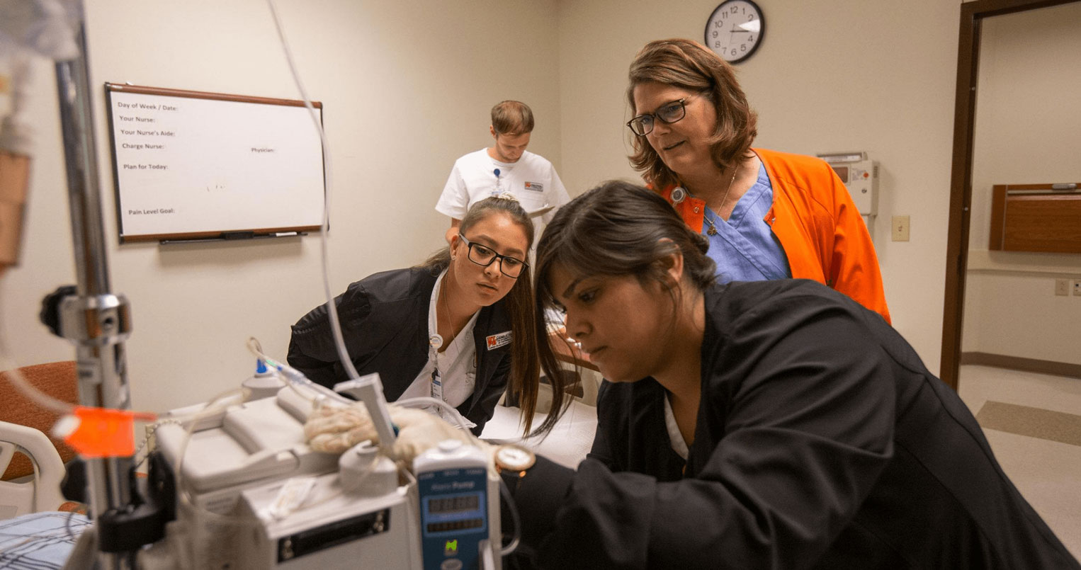 Nursing student in sim lab