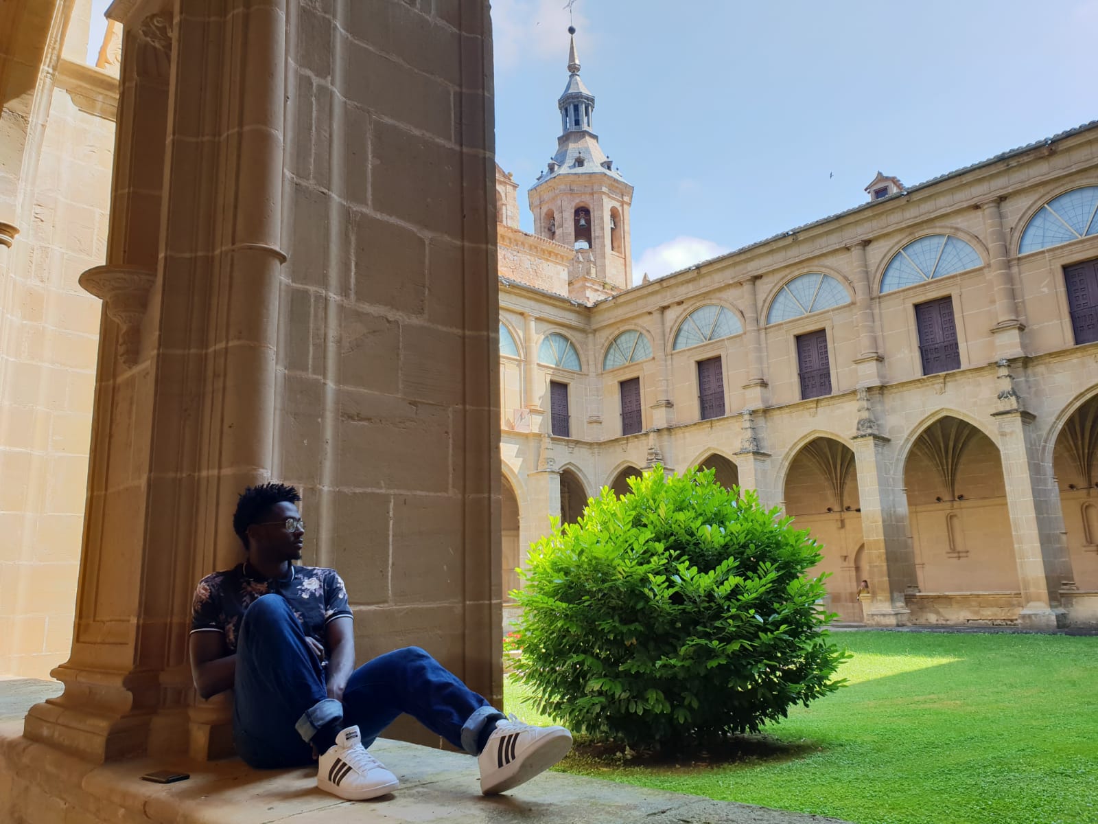 student sitting in Spain