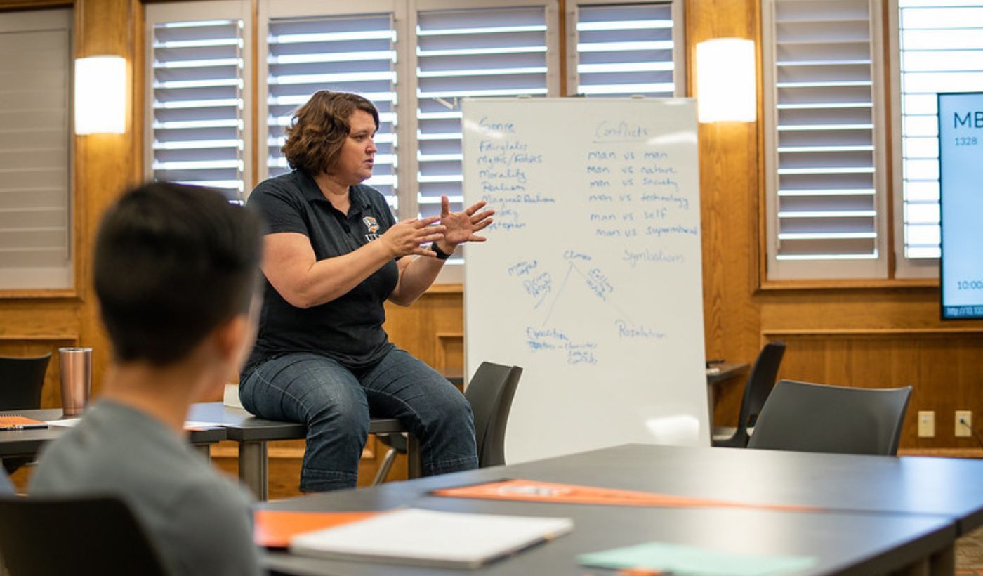 Professor teaching at writing camp