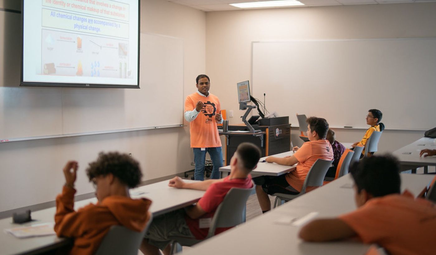 Professor teaching at engineering camp